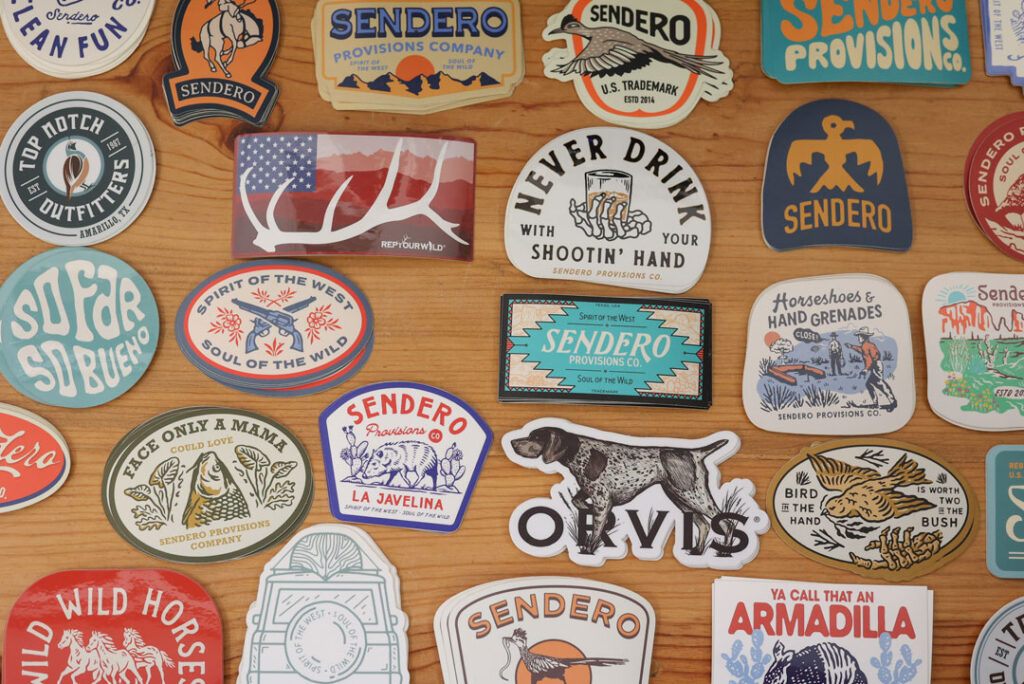 stickers from sendero, orvis, top notch outfitters, rep your water, rep your wild