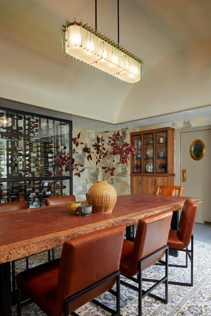 Interior Design project in the Texas Panhandle featuring a dining room with bold colors, autumnal textures, and a modern wine cellar.