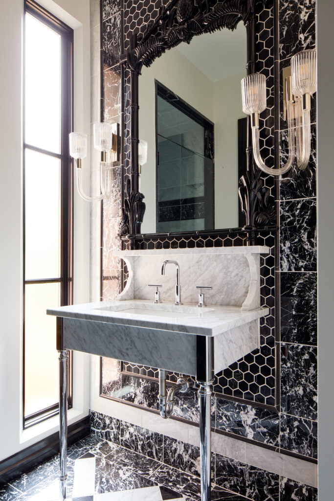 Interior Design project in the Texas Panhandle featuring a bathroom sink with clean marble, and luxury stone and tile.